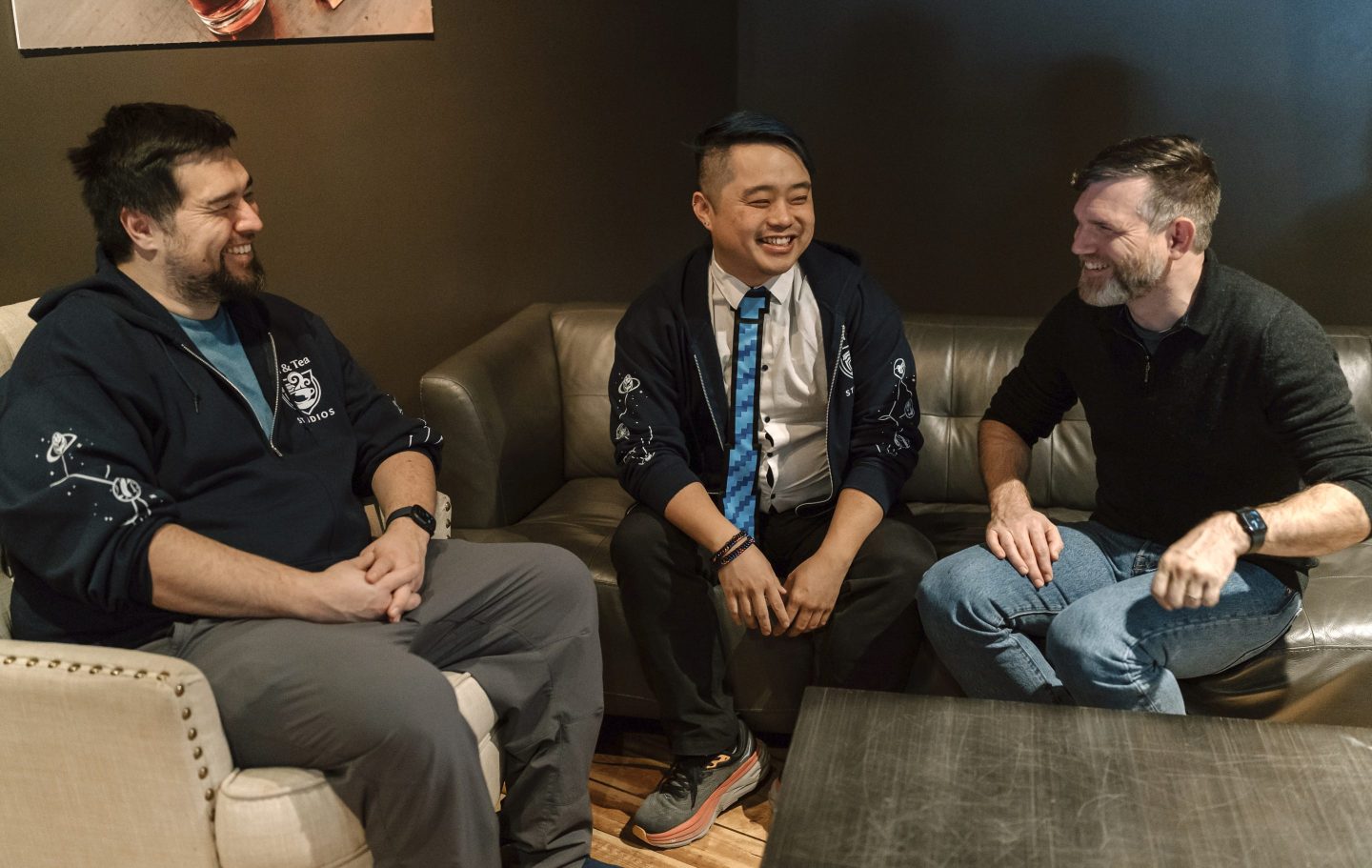 Jam &amp; Tea Studios founders, left to right, Michael Yichao, Carl Kwoh, and J. Aaron Farr sit for photos on Jan. 18, 2024, in Roslyn, Wash. (Lutisha Aubrey Photography via AP)